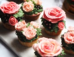 Valentine's Day handpiped soft pink buttercream rose cupcakes from Nine Tea Cups Bakery
